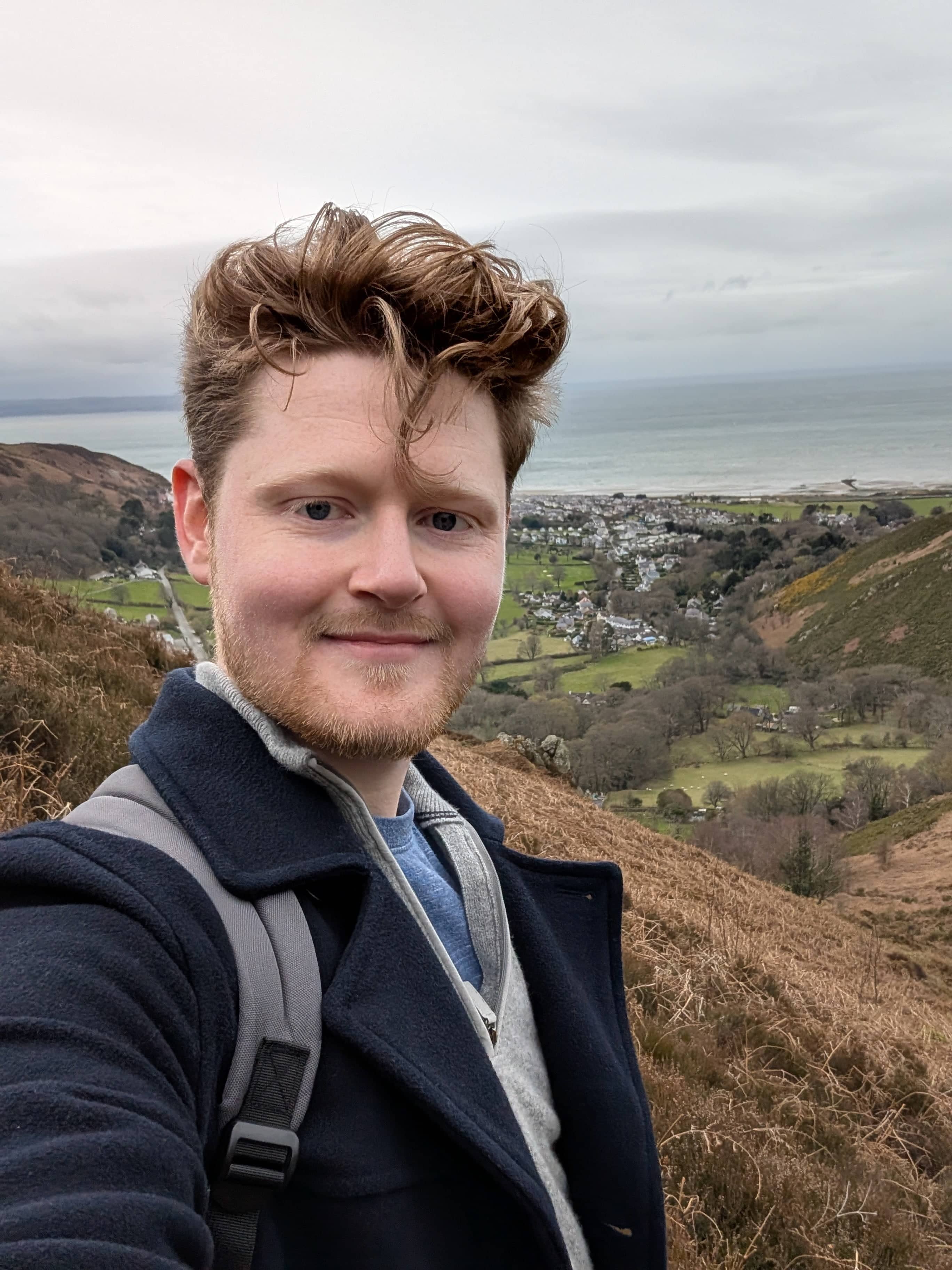 Profile photo of Angus Hally, out hiking in Wales